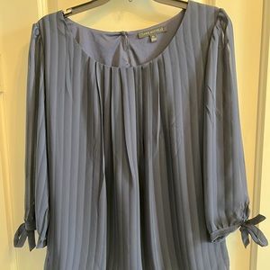 Navy silk like pleated top size Med.